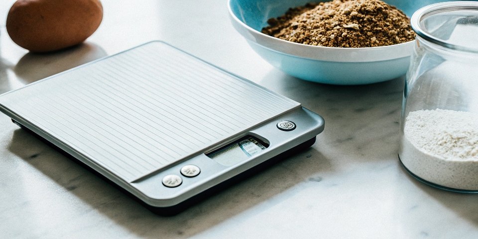 Measuring Ingredients with a Digital Scale ingredients being weighed on a digital scale for a recipe
