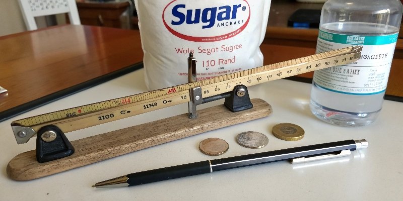 DIY Lever Balance A simple DIY lever balance made with a ruler, a pen, and coins