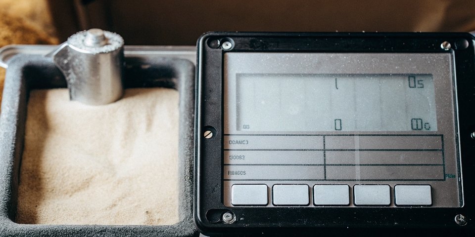 Scale Calibration Process A close-up of a digital scale's display during the calibration process.