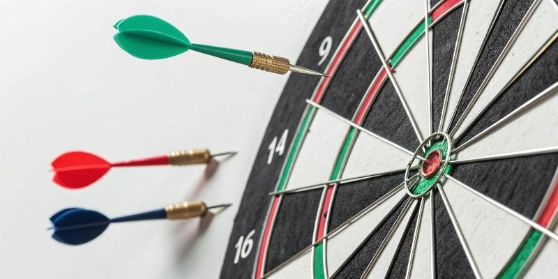An infographic showing the difference between accuracy and precision using dartboard targets.