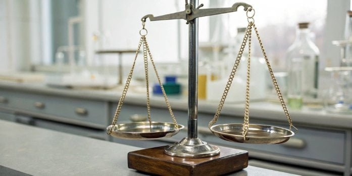 An analytical balance and a precision balance side-by-side