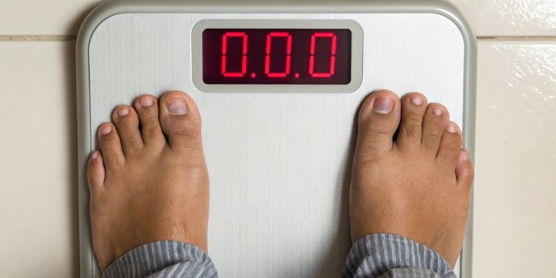 Digital Scale Overload Error A digital scale display showing the word "OVERLOAD" in red letters.