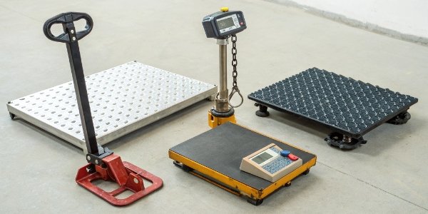 Types of Sheep Weighing Scales A collection of different sheep scales including mechanical, electronic, and hydraulic models.