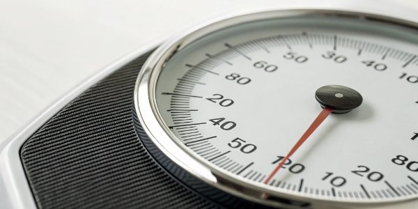 Determining Scale Accuracy and Resolution A close-up of a digital scale display showing a precise weight measurement to several decimal places.