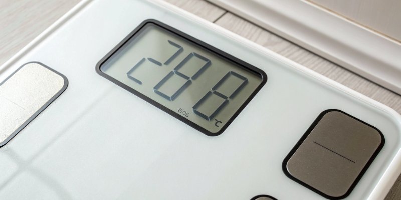 Digital scale display showing tare function completed A close-up of a digital scale display showing zero after taring