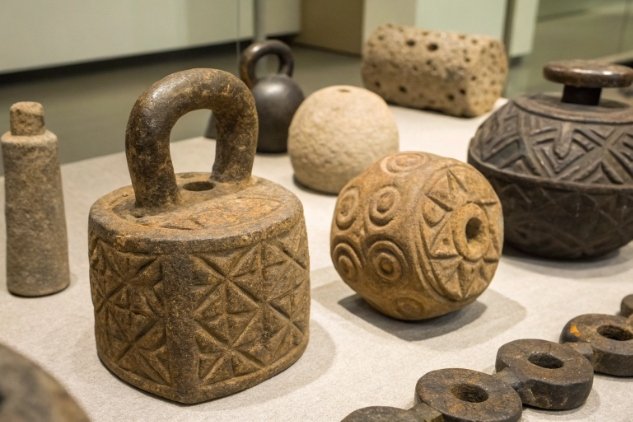 Ancient Standard Weights A collection of ancient carved stone and metal weights