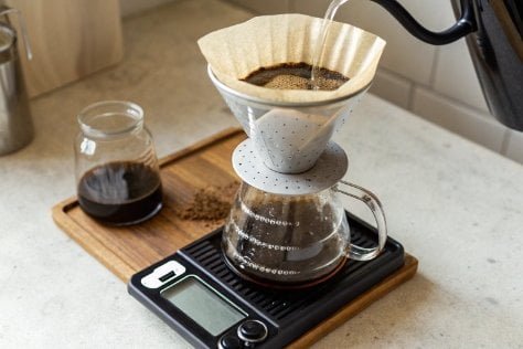 Using Tare on a Coffee Scale A coffee scale being used for a pour-over brew with Tare function highlighted