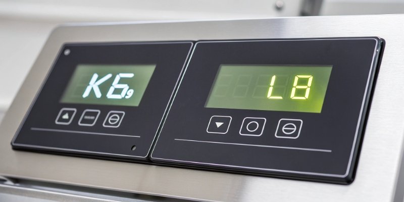 Units of Weight: KG vs LB A digital scale indicator showing weight in both kilograms and pounds