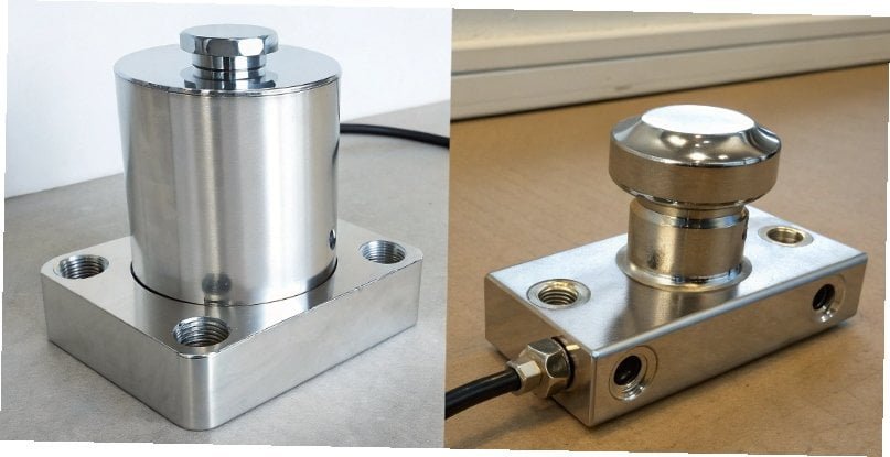 A side-by-side view of a shiny stainless steel load cell and an aluminum load cell