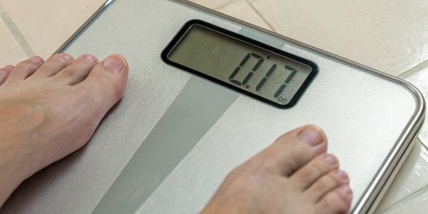 Early Warning Signs of Scale Failure A digital scale display showing flickering, unstable numbers