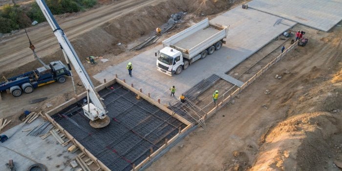 Truck Scale Installation Process A bird's eye view of a truck scale being installed on a construction site.