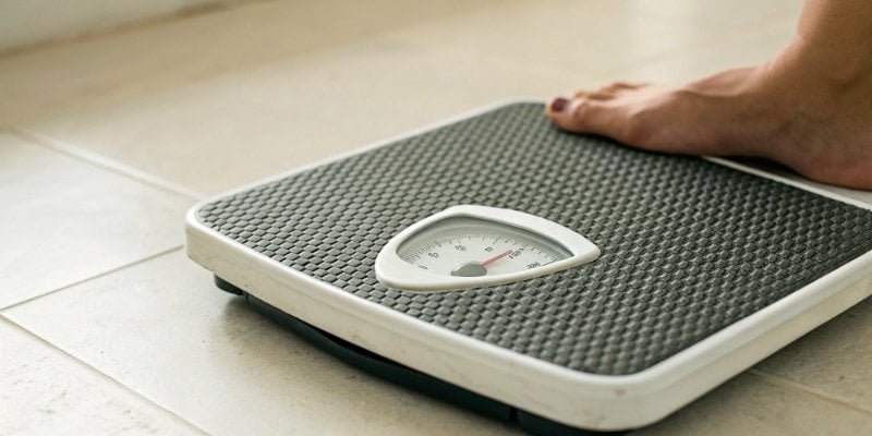 a digital scale with a drifting, unstable number on its display