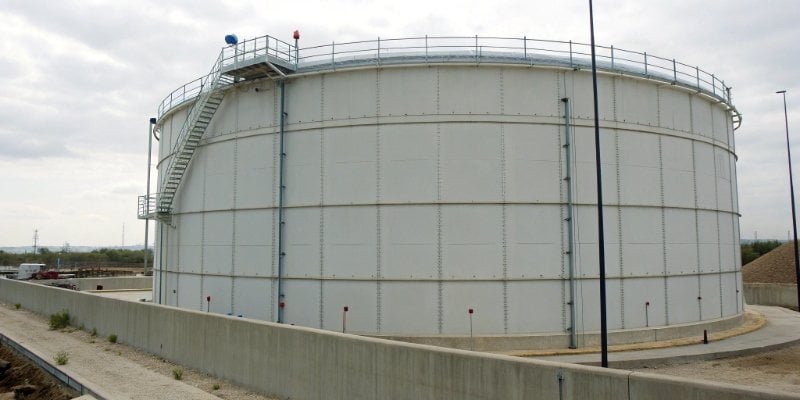 Diagram of an Interstitial Monitoring Device A cross-section of a double-walled tank showing the interstitial space