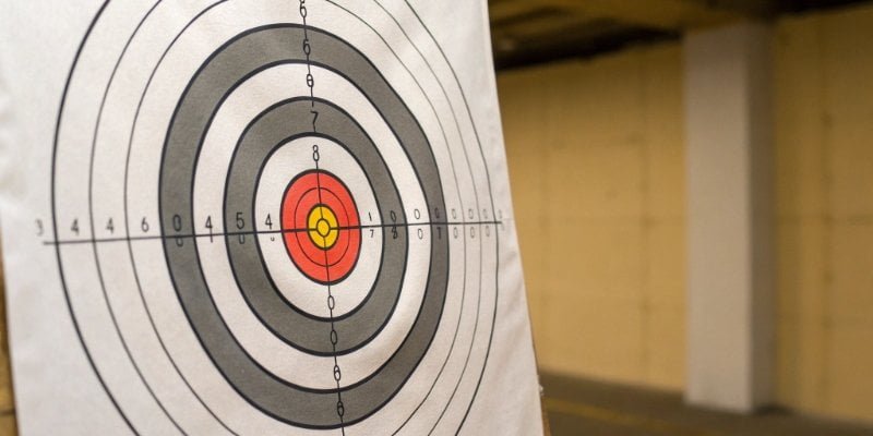 Digital Scale Accuracy and Uncertainty A graphic illustrating the concept of measurement uncertainty with a target diagram