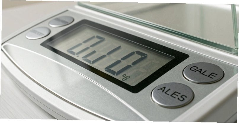 A close-up of a digital display showing a weight to four decimal places