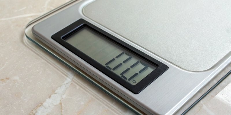 A digital scale display showing a zero reading