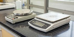 What is the difference between scale calibration and replacement?