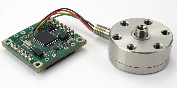 Analog vs Digital Load Cell An analog and a digital load cell side by side for comparison