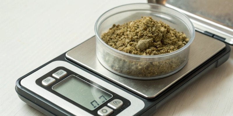 Measuring a Tenth of a Gram A digital scale showing a reading of 0.1 grams