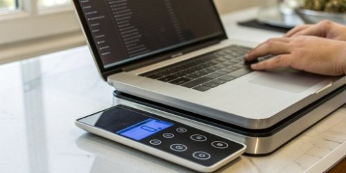 A programmable scale being configured on a laptop