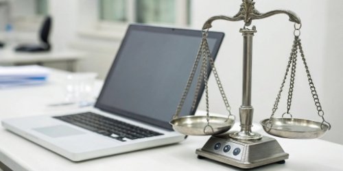 Programmable Weighing Scale Hardware and Software A programmable weighing scale connected to a computer, symbolizing hardware and software integration