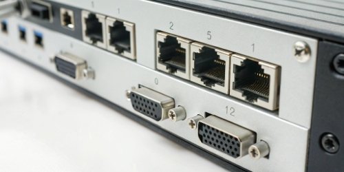 close-up of communication ports on an industrial scale, including Ethernet, USB, and RS-232