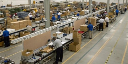 Hidden Production Costs A crowded and inefficient factory floor