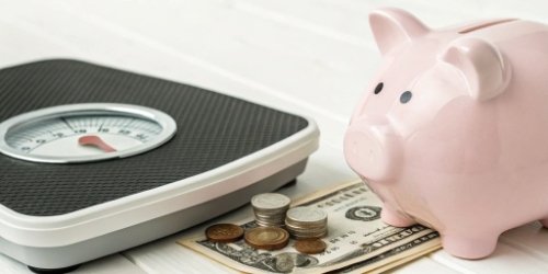 Reduced Onboarding and Training Costs A piggy bank next to a smart scale, symbolizing cost savings.