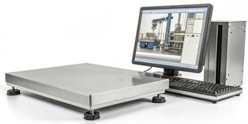 A sturdy industrial PC scale connected to a computer displaying weighing software interface