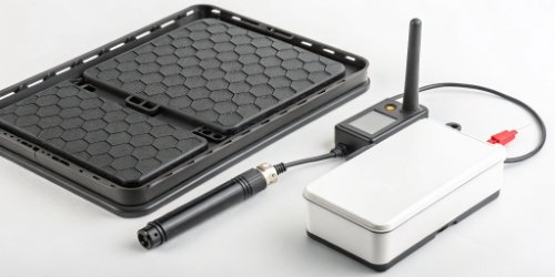 Key Integration Components A close-up of the essential components for a mobile scale setup: battery, rugged scale, and Wi-Fi antenna.