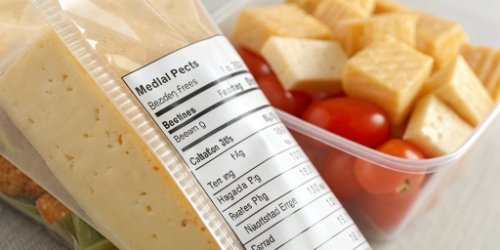 A close-up of a food package where the label weight is clearly incorrect for the product inside