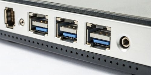 PC Scale Connectivity Ports A close-up shot of the I/O ports on a PC scale, showing USB, COM, and LAN connectors