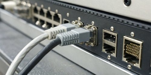 A close-up shot of the connection ports on an industrial scale, showing Ethernet, USB, and RS-232 ports