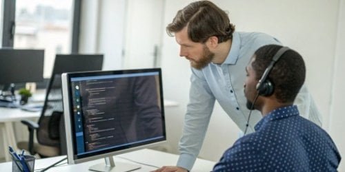 API/SDK Technical Support A support engineer assisting a client over a video call with code on the screen