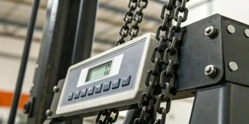 A close-up of an IP rating label on an industrial scale.