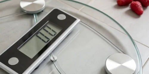 A digital scale display showing a precise weight measurement, highlighting accuracy