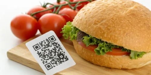 An appealing image of a final food product with a QR code that a consumer can scan for traceability information.