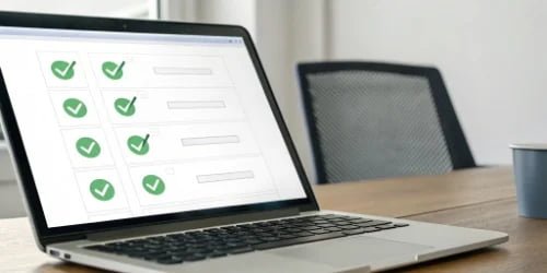 A computer screen on a PC scale showing green checkmarks for validated data fields.