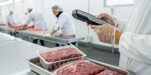A QR code on a meat package being scanned to show traceability information