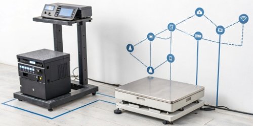 Diagram showing a weighing scale connected to a central database and printer via API