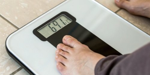 Measuring Sorting Performance with Technology A close-up of a smart scale's digital display showing weight and a barcode.