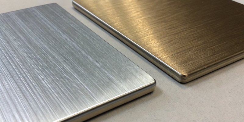 A close-up shot showing the texture and finish of 304 and 316 stainless steel side by side.