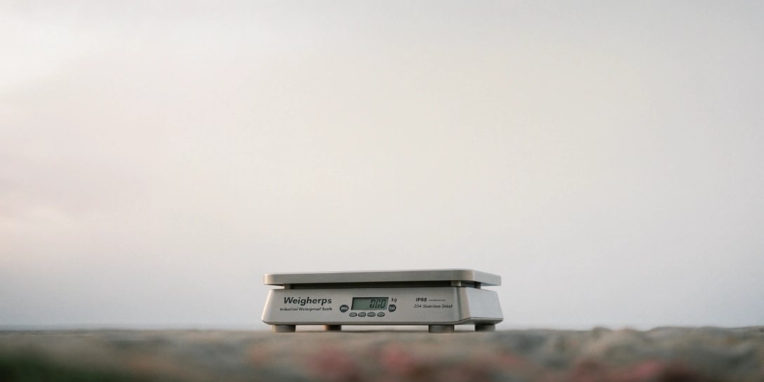 The Weigherps waterproof scale in a clean, modern product shot showcasing its features
