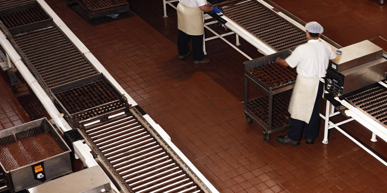 A modern factory production line with automated weighing solutions.